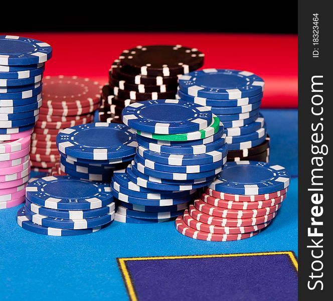 Set of gambling chips on poker table