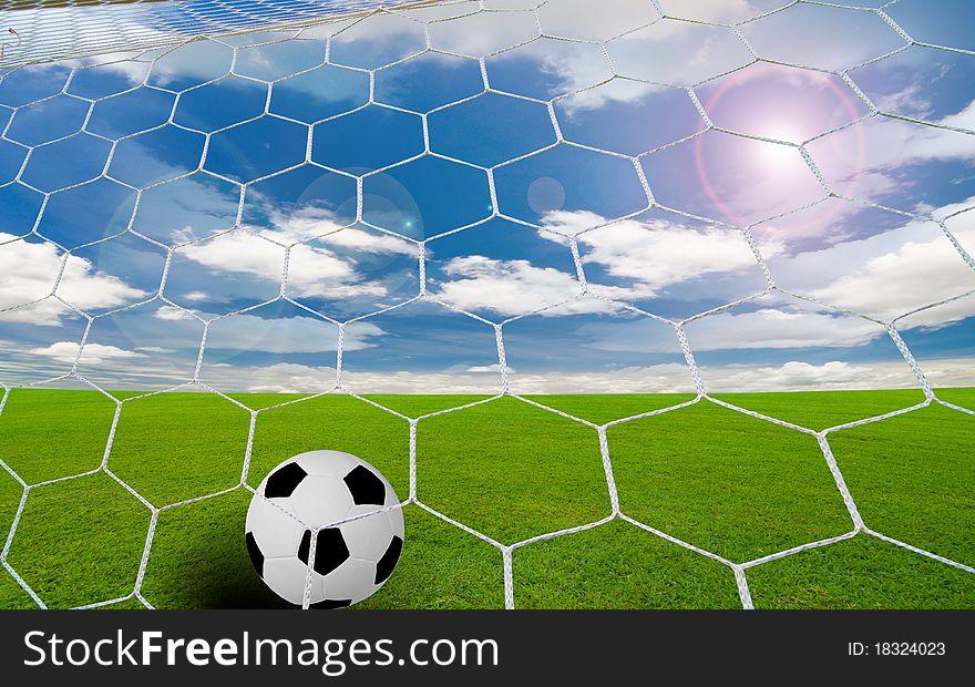 Soccer goal under the blue sky