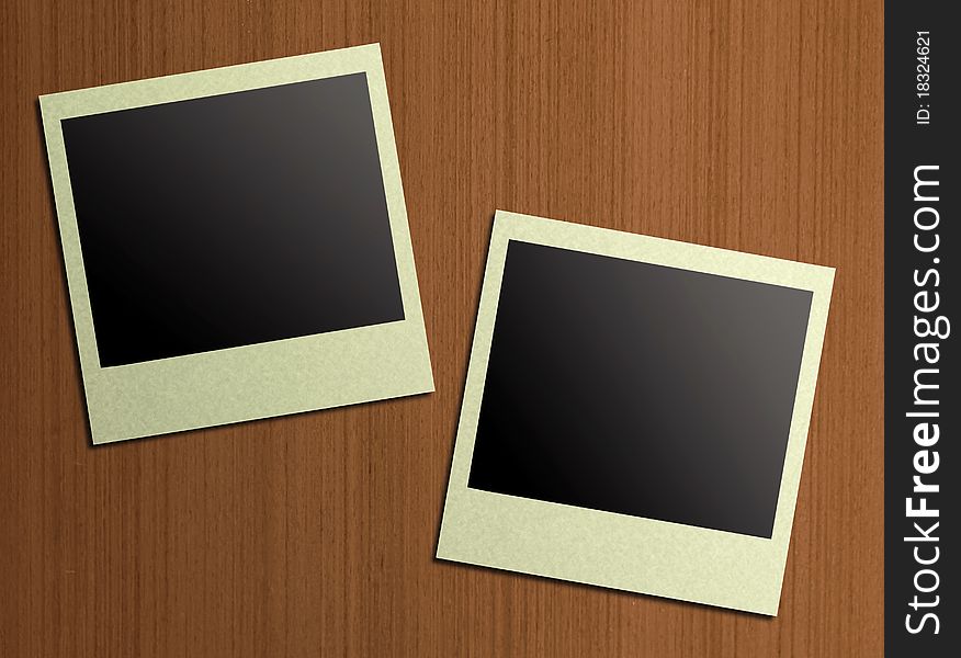 Blank photos on a wood background illustration