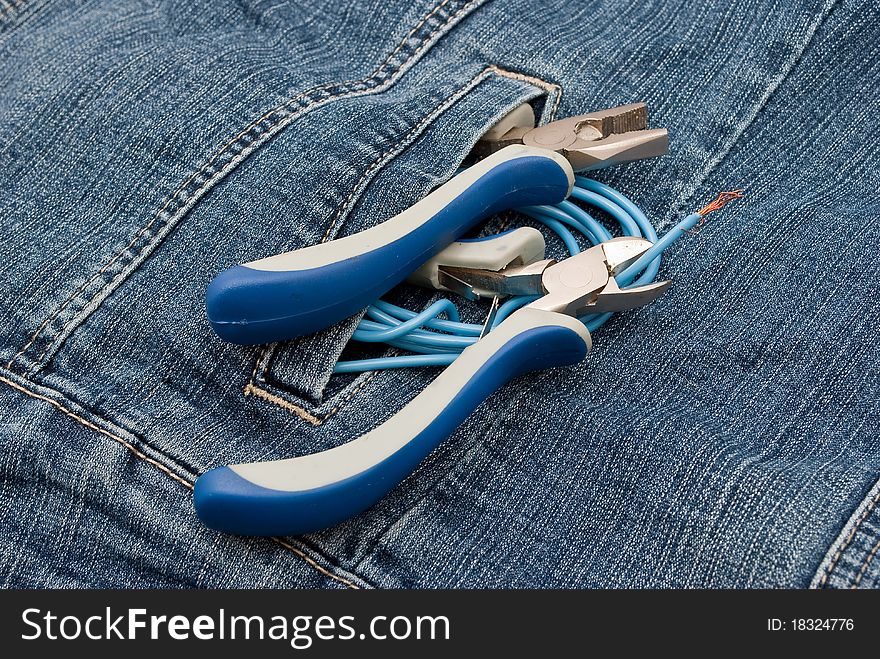 Pliers to repair a pocket of jeans