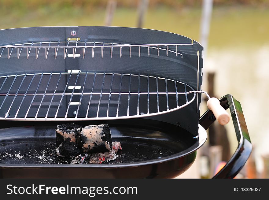 Charcoal Barbecue grill with nothing on it
. Charcoal Barbecue grill with nothing on it
.