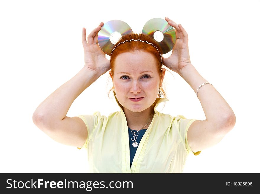 Redhead young woman holding a CD upon the head. Redhead young woman holding a CD upon the head