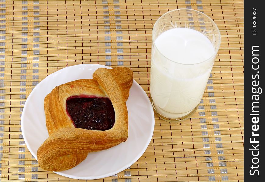 Fruit puff pastry with milk. Breakfast