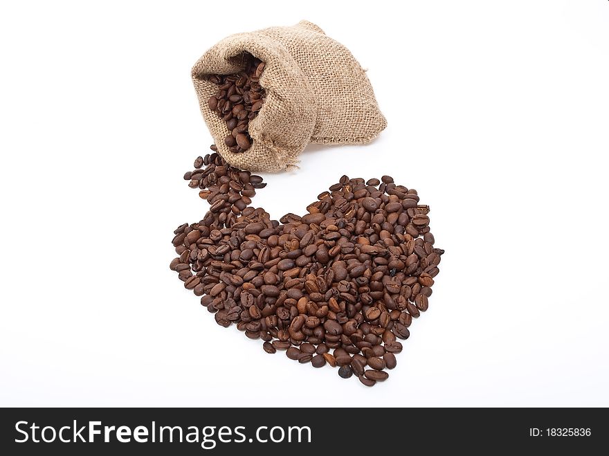 Burlap sack with coffee heart on white