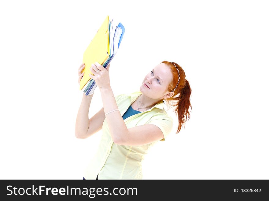 Redhead young woman student holding a notebooks