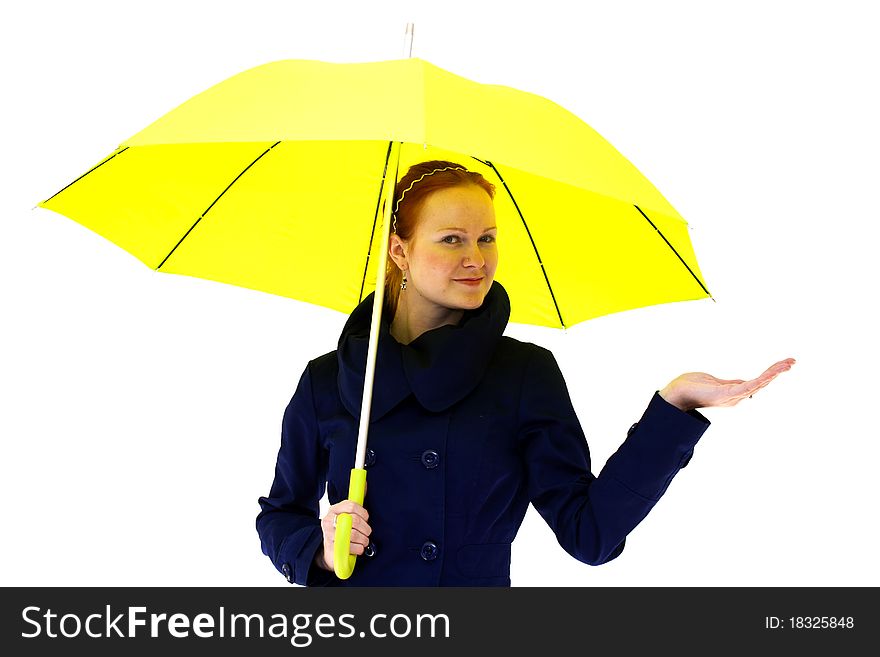 Redhead young woman holding an yellow umbrella. Redhead young woman holding an yellow umbrella