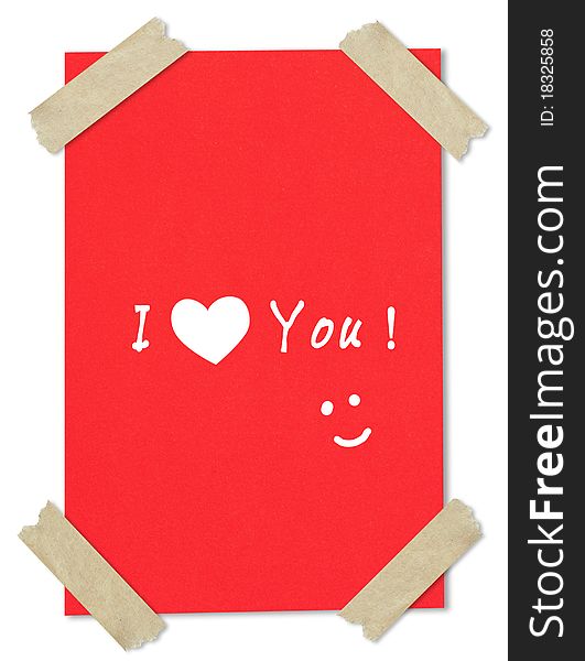 MessageI love you writing on red paper stuck with brown tape. MessageI love you writing on red paper stuck with brown tape