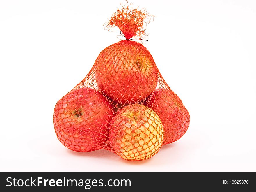 Apples in a sack on white background