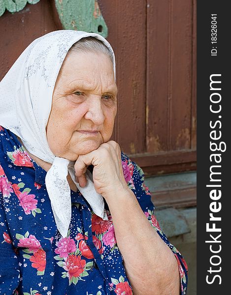 Portrait of the old woman outdoor