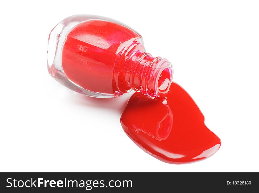 Red nail polish isolated on a white background