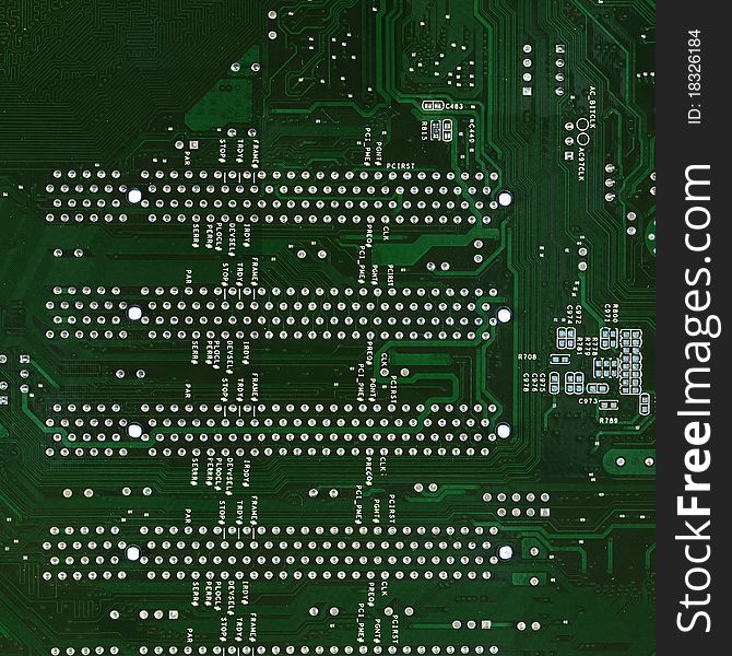 Close up of computer circuit board in the green