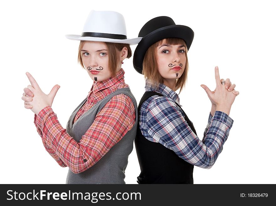 Two girls with painted mustaches and bowler hats on white background