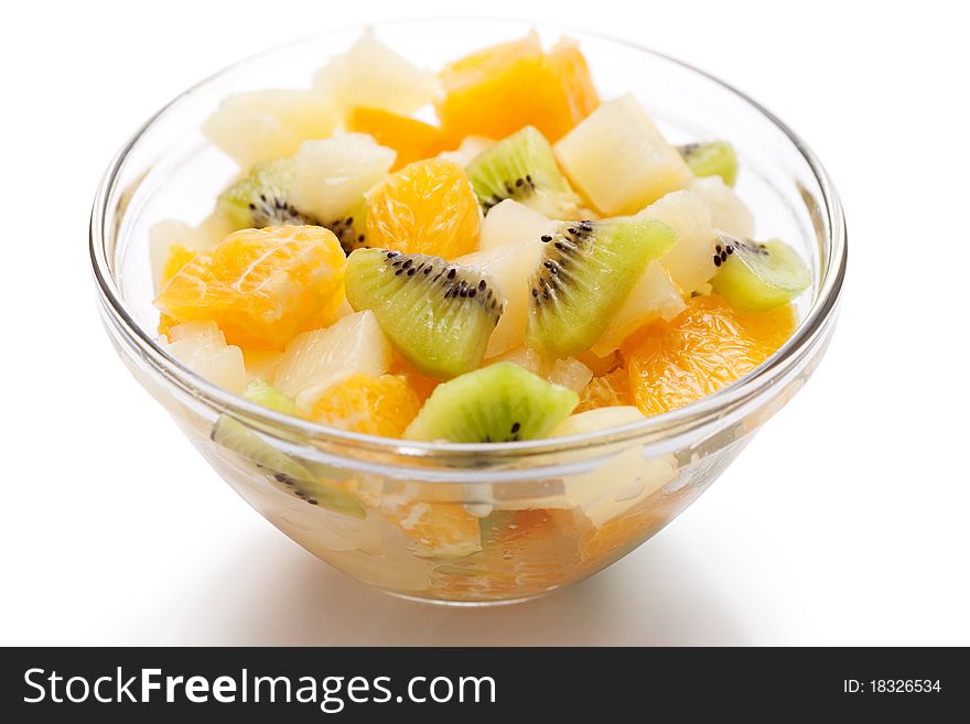 Fresh fruits salad on white background