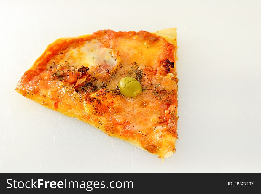 Slice of a delicious pizza with mozzarella cheese, tomatoes, basil, and olives. Slice of a delicious pizza with mozzarella cheese, tomatoes, basil, and olives.