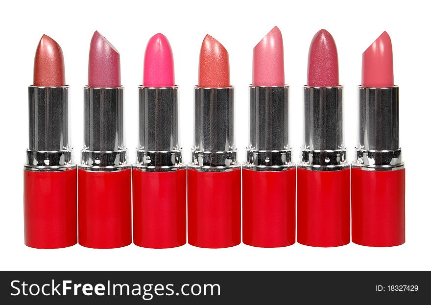 lipsticks abreast isolated on a white background