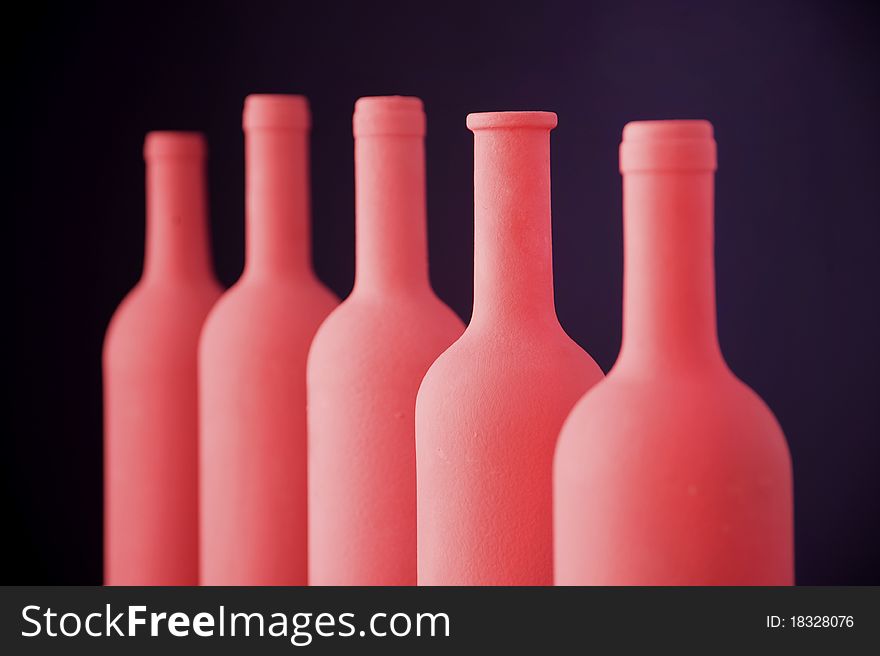 Refined bottle with violet background