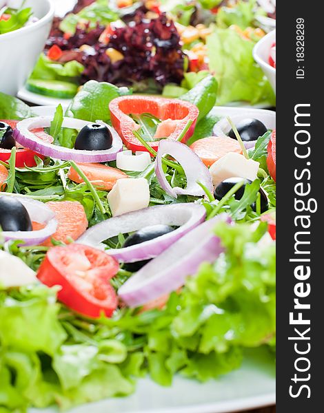 Healthy fresh salad setting on table.
