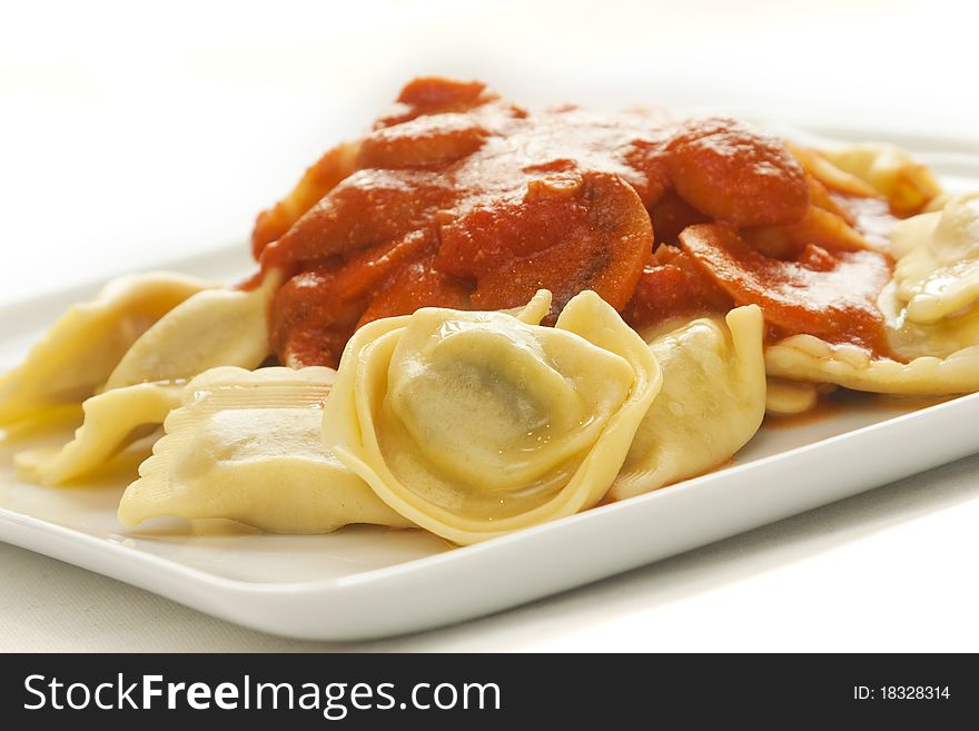 Ravioli, Italian pasta, with cherry tomato sauce. Ravioli, Italian pasta, with cherry tomato sauce