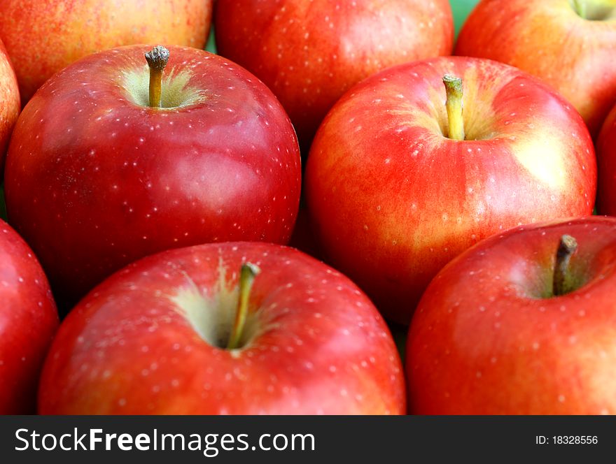 Close-up row of red apples. Close-up row of red apples