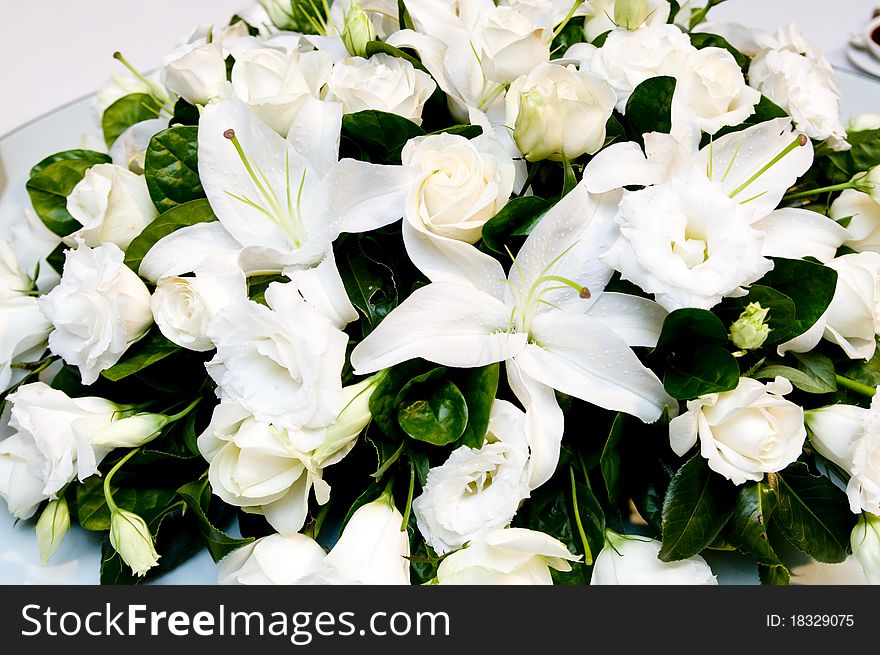 The wedding decoration with white lily and rose