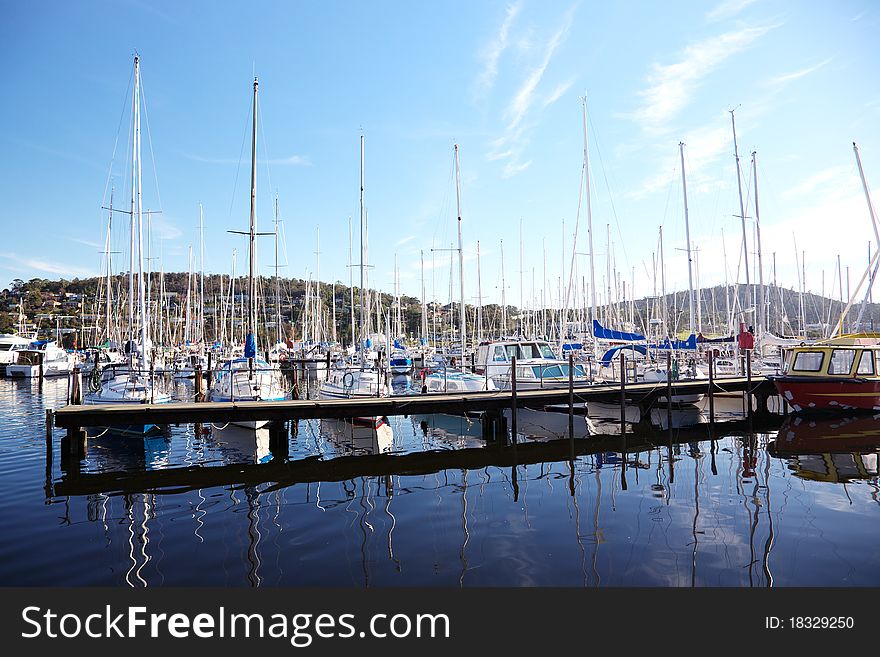 Yachts lined up in the harbor at Bellerive, Tasmania.