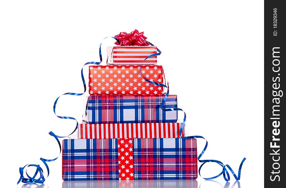 A stack of red white blue gifts