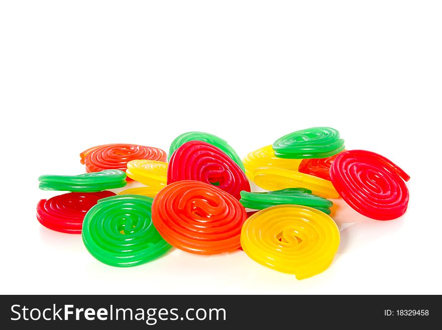 Many sorts of colorful candy isolated over white