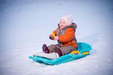 Adorable Baby Sliding On Sleigh From Hill Royalty Free Stock Photos Adorable Baby Sliding On Sleigh From Hill Royalty Free Stock Photos