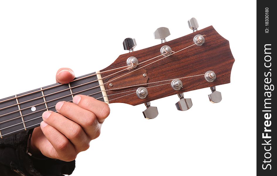 Guitarist with his hand on headstock over white background