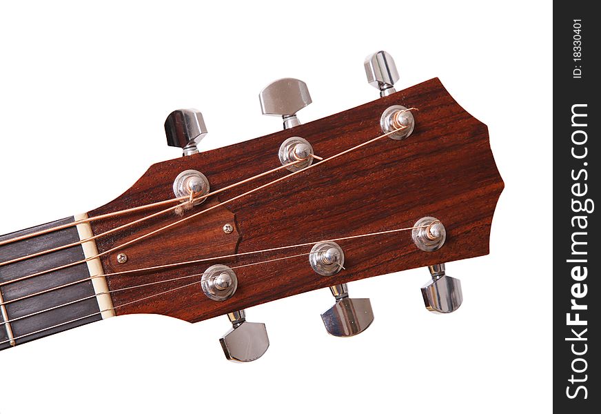 Wooden headstock of the guitar over white background. Wooden headstock of the guitar over white background