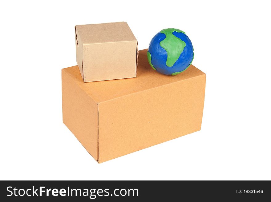 Two packing boxes and model of the globe on a white background. Two packing boxes and model of the globe on a white background