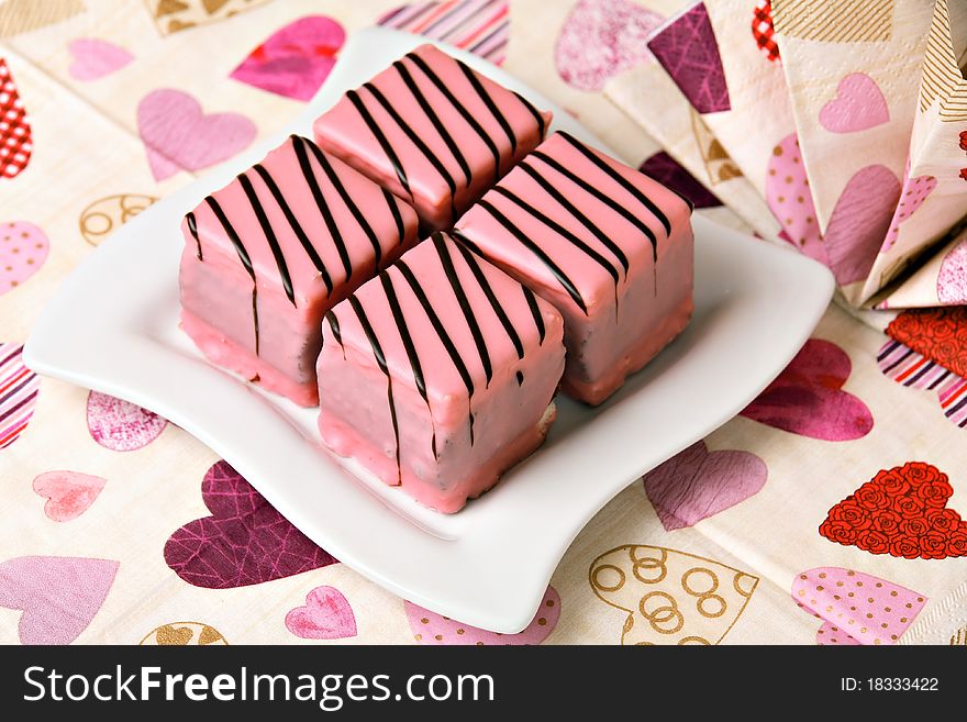 Pink Cakes on white ceramic plate