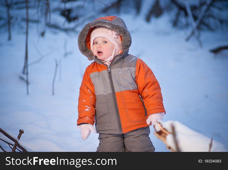 Adorable baby walking in evening park. Wondering when found broken tree. Adorable baby walking in evening park. Wondering when found broken tree