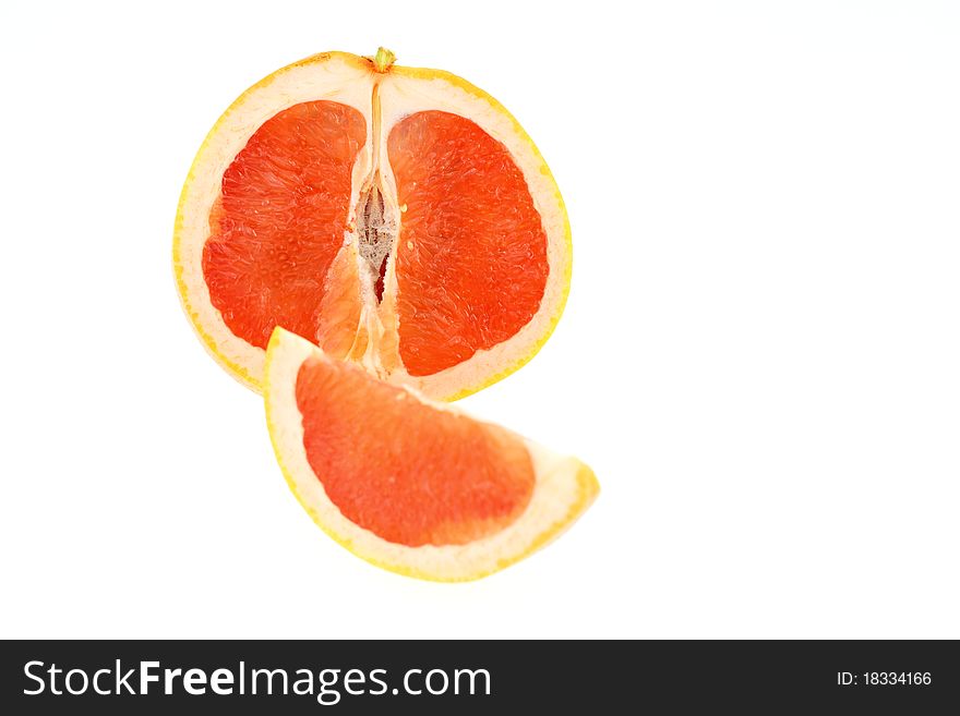 Ripe Juicy Grapefruit With One Slice