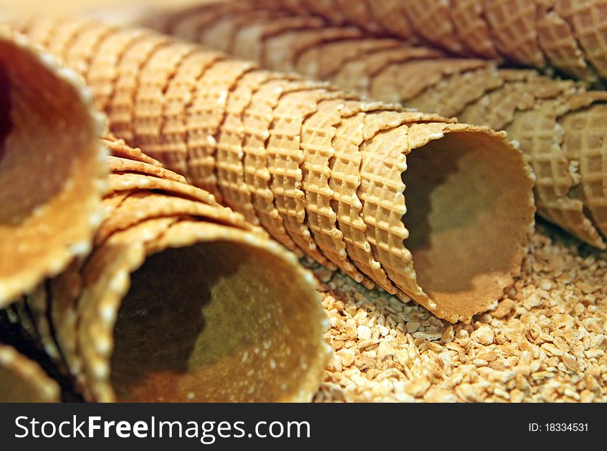 A lot of sugar ice cream cones close up