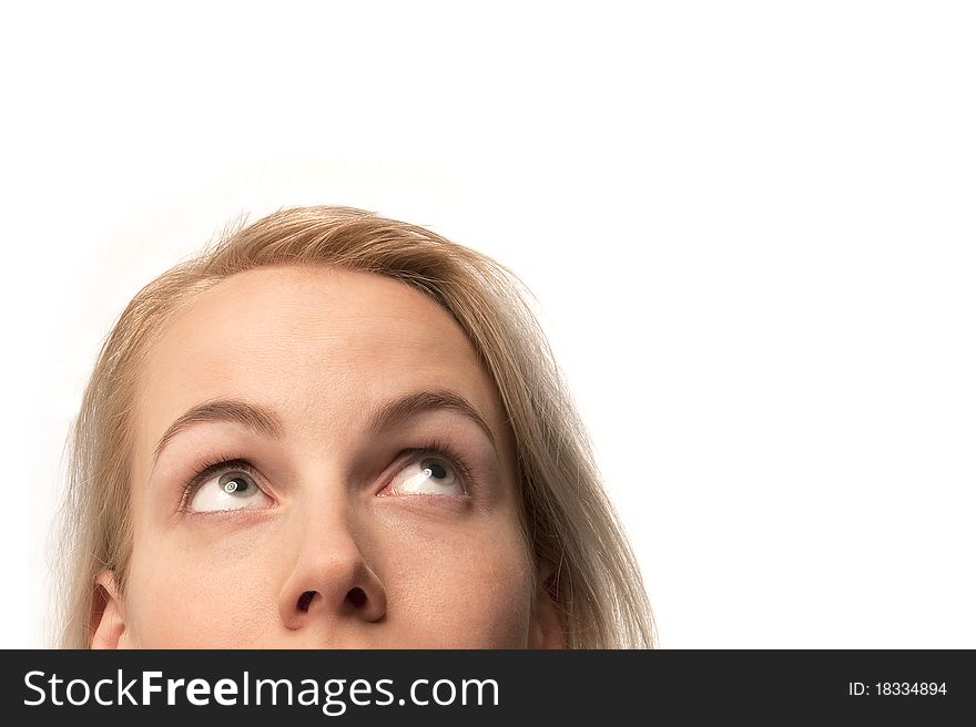 A half portrait of a blond woman looking up. A half portrait of a blond woman looking up.