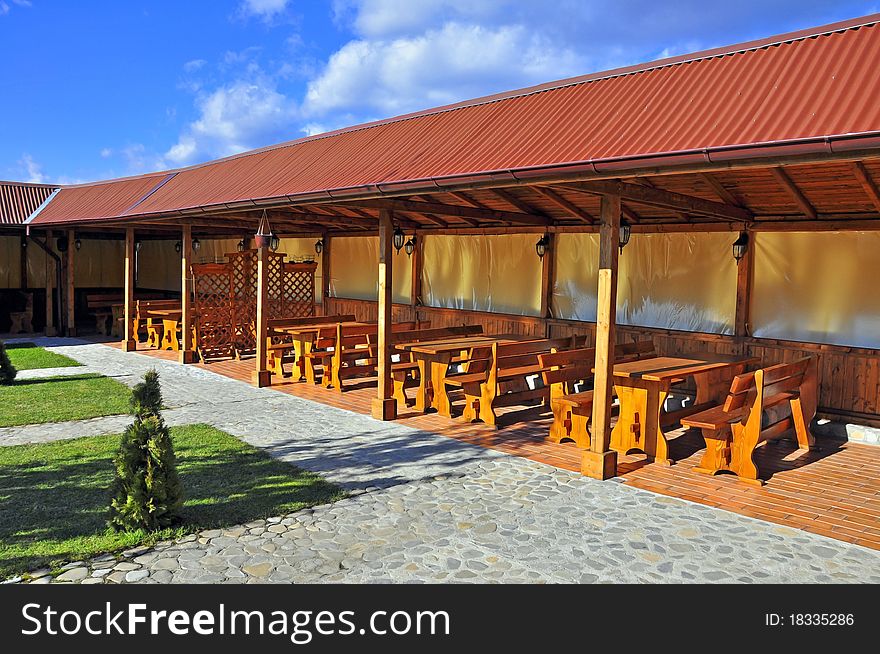 Wooden restaurant terrace in a sunny day