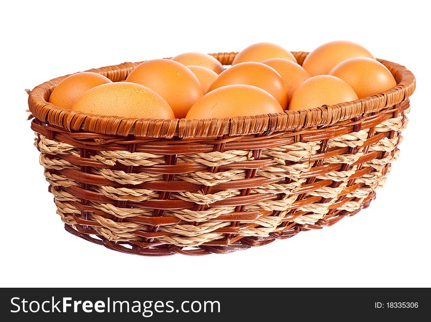 Eggs in bamboo basket with white background