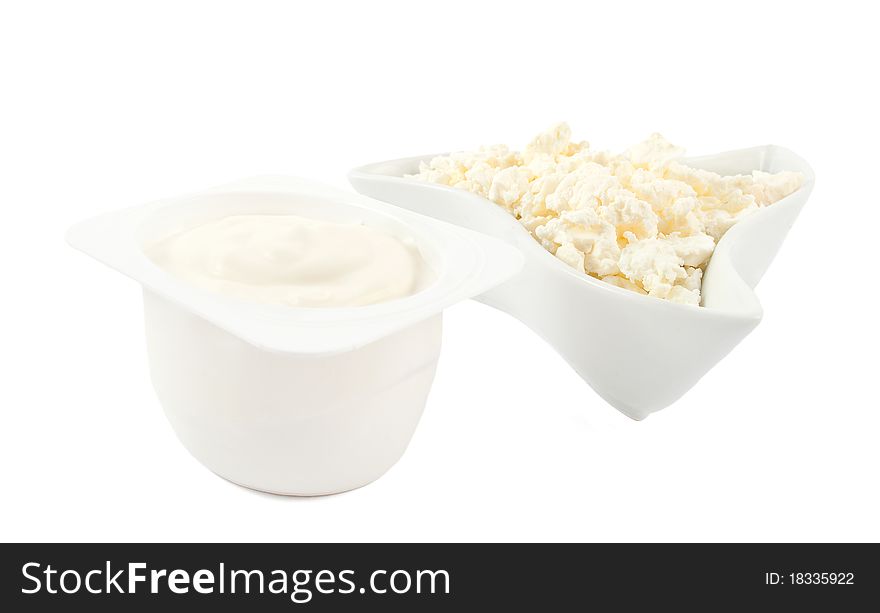Yogurt and cottage cheese on a white background