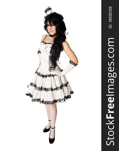 Pretty woman in beautiful old-fashioned dress posing like a doll