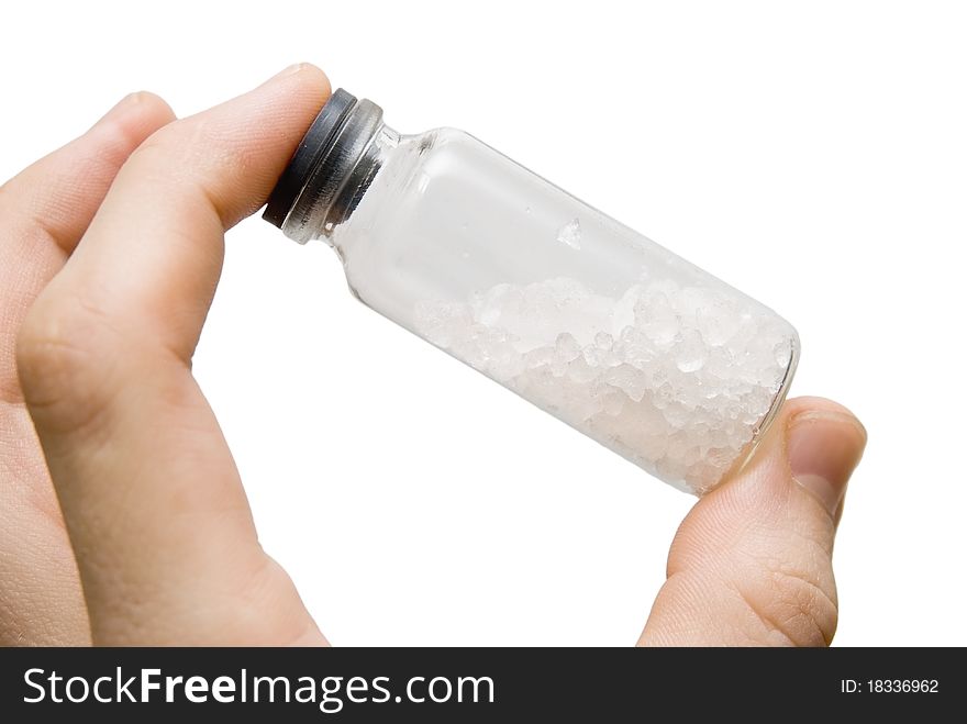 Test tube in fingers with substance