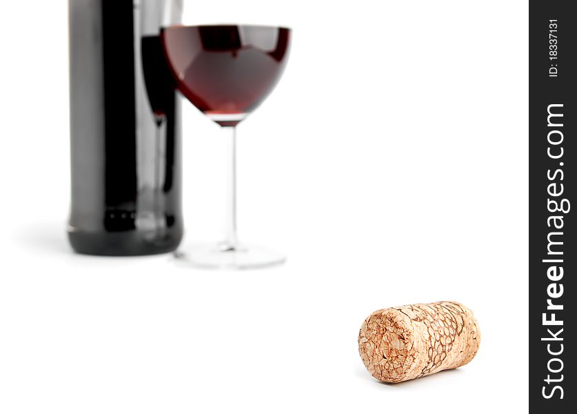 Wine cork and glass on white. Wine cork and glass on white