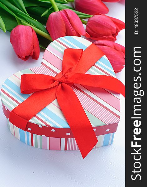 Gift box shape of heart and tulip flowers. Gift box shape of heart and tulip flowers