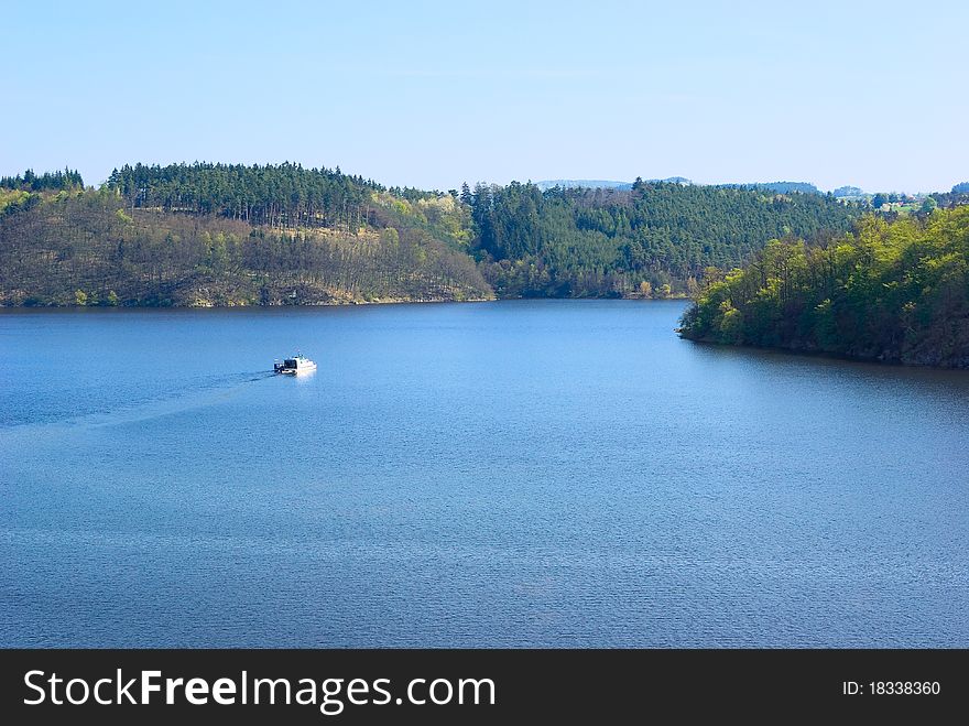 View from the top point on the river Vltava in the spring morning. Castle Orlik nad Vltavou (the German name: Burg Worlik). Czechia. View from the top point on the river Vltava in the spring morning. Castle Orlik nad Vltavou (the German name: Burg Worlik). Czechia.