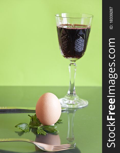 Egg and wine on the table