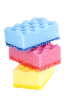 Red, Yellow, And Blue Sponges Stock Photo