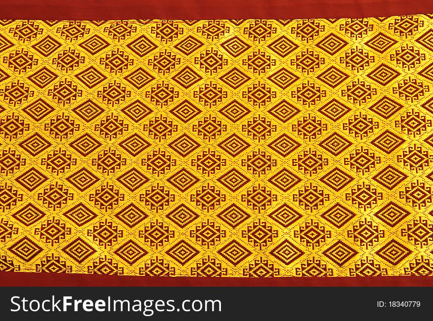 Gold and square design textile. Gold and square design textile