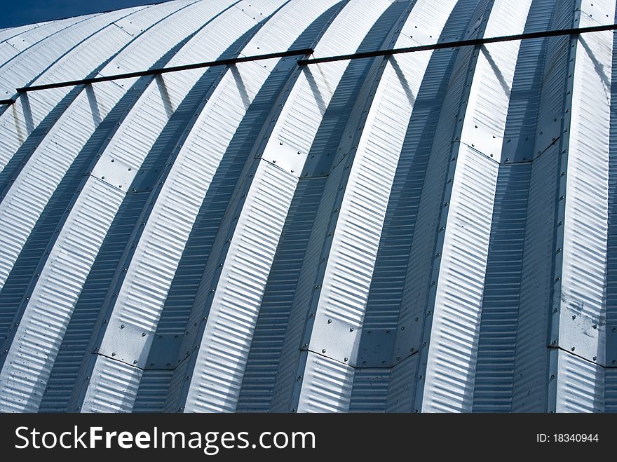 Close up of metal roof with light and shadow