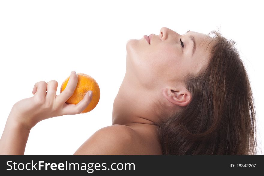 The woman with an orange fruit the isolated image