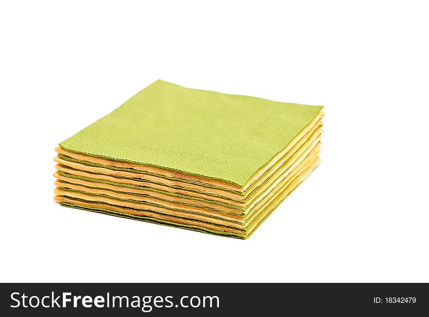 Green and yellow napkins isolated on a white background. Green and yellow napkins isolated on a white background.